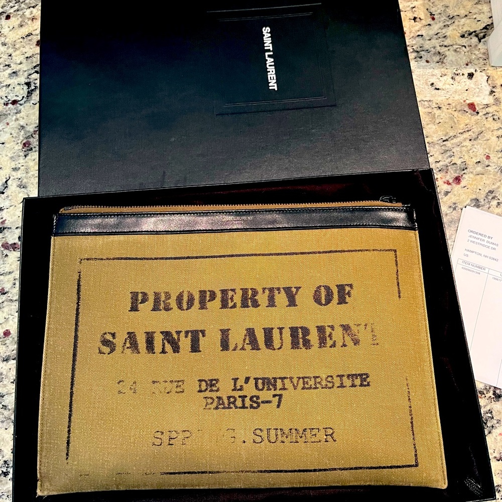 Yves St Laurent Khaki clutch bag gently used with dust bag, box and receipt saks